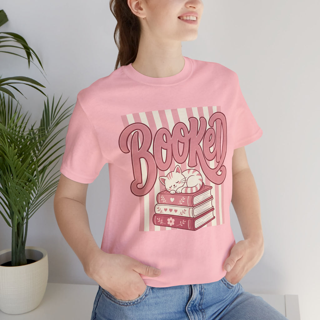 Booked Tee — Cute Cat on Stack of Books Graphic Shirt