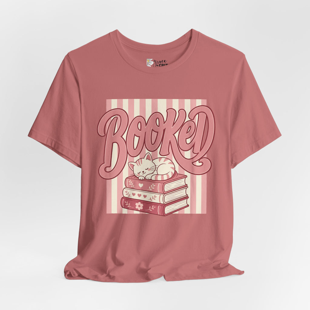 Booked Tee — Cute Cat on Stack of Books Graphic Shirt