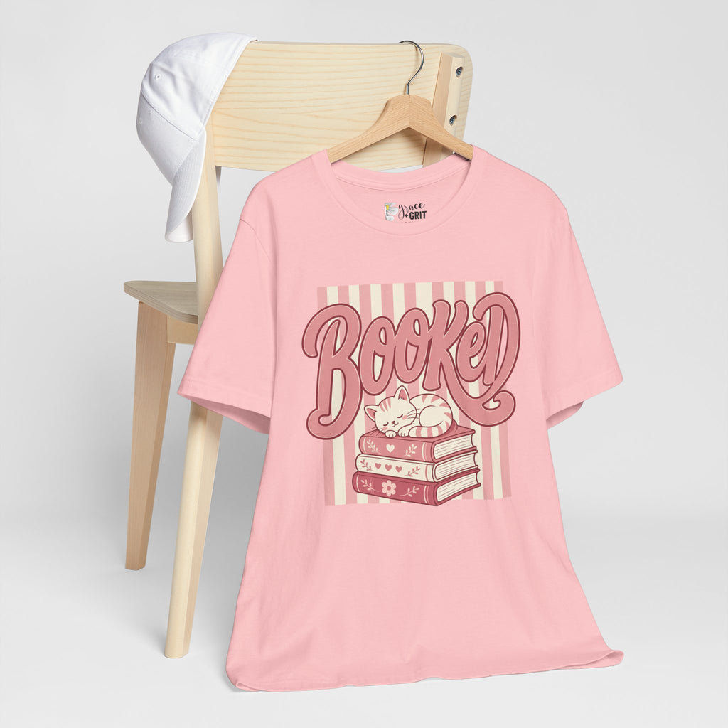 Booked Tee — Cute Cat on Stack of Books Graphic Shirt