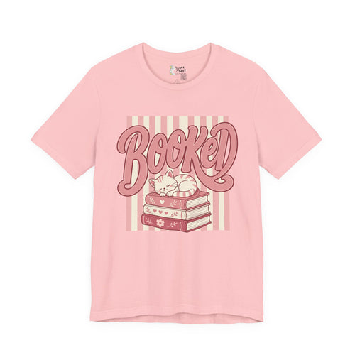 Booked Tee — Cute Cat on Stack of Books Graphic Shirt