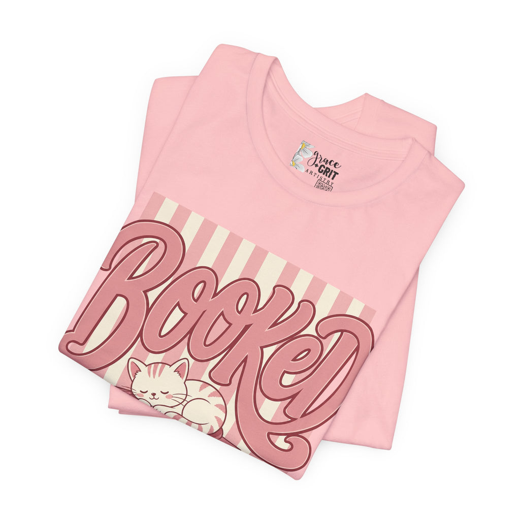 Booked Tee — Cute Cat on Stack of Books Graphic Shirt